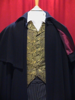 THE WOOLLEN BLACK VENETIAN CAPE